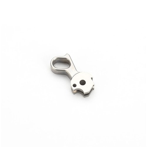 The 1911 Barstock Hardcore® Hammer by Ed Brown is crafted from tough 4140 alloy or 420 stainless steel, ensuring durability with no sharp edges for safe handling.