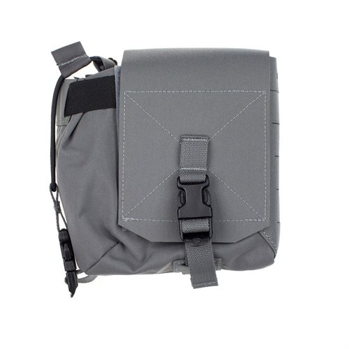 The SPIRITUS SYSTEMS Mutant Pouch offers versatile MOLLE storage with dual compartments for radios and magazines, ensuring secure gear retention and easy access.