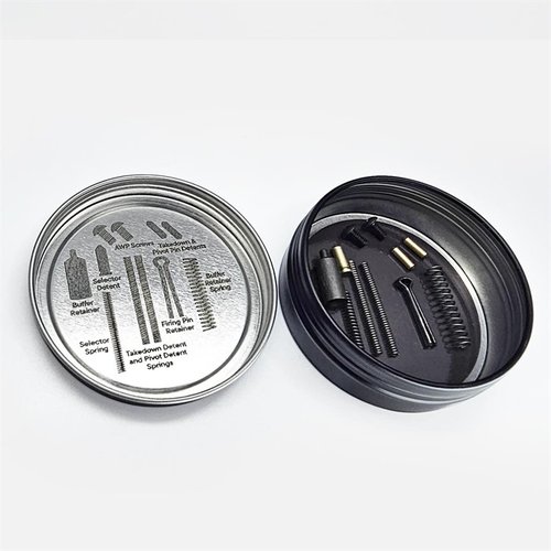 The RISE Armament Oh S#IT Spare Parts Kit for AR-15 keeps essential parts organized and magnetized for easy access, featuring a screw-top tin and quick ID guide.