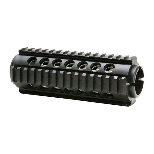 Enhance your AR-15 with this durable two-piece Quad-Rail Handguard, featuring multiple Picatinny attachment points and aluminum heat-shields for optimal performance.